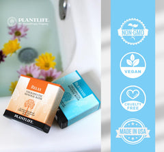 Plantlife Sore Muscle Therapy Bath Salts dissolving water signals relaxation potential.