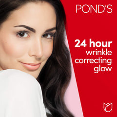 POND'S Age Miracle Night Cream application close-up demonstrates gentle massaging for bedtime skincare.