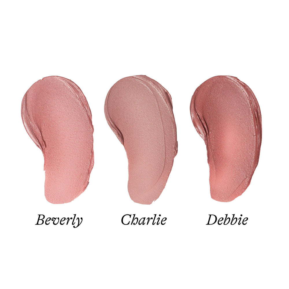 Poppy & Pout beeswax-based formula close-up for natural nourishment.