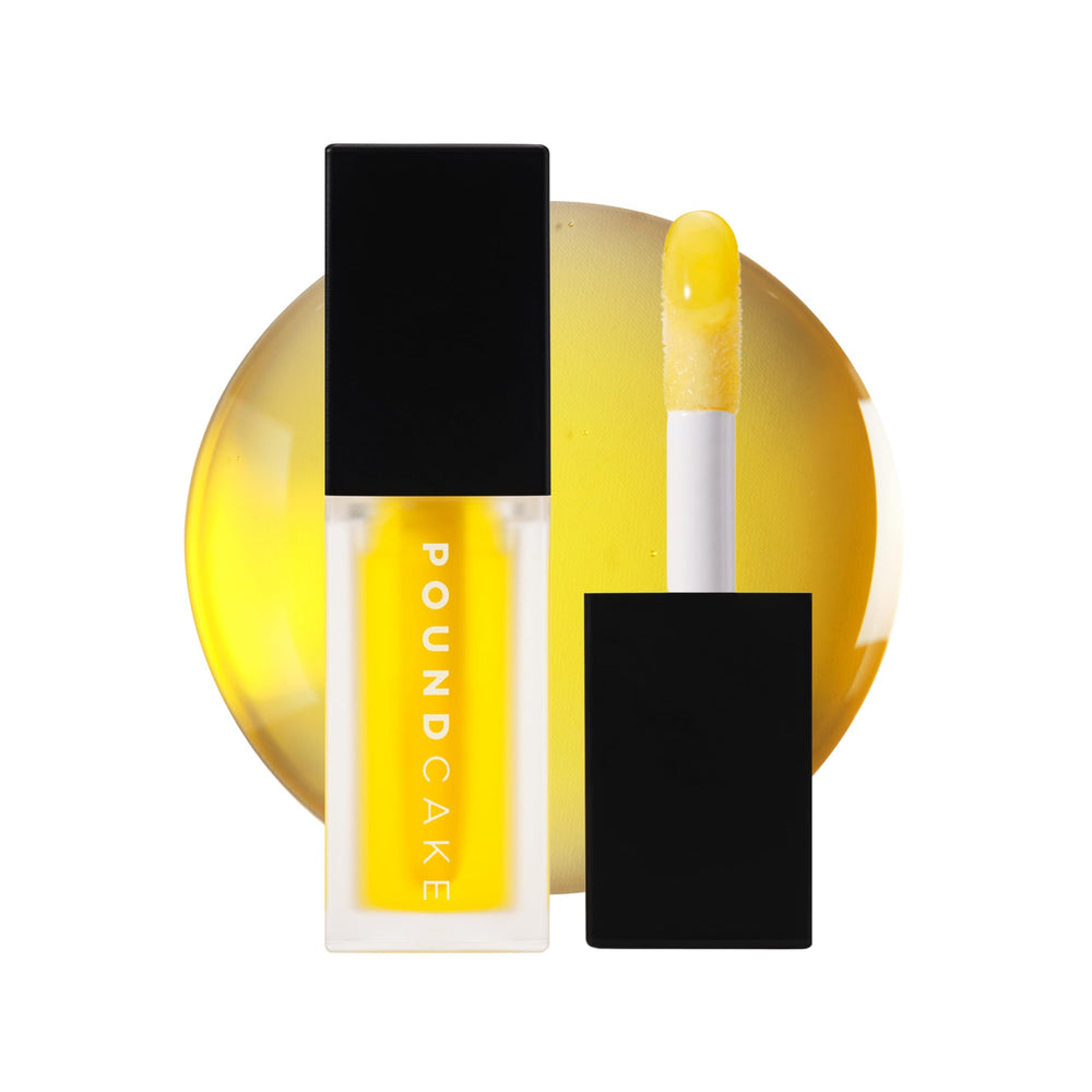 POUND CAKE Cake Theory lip oil bottle with golden tint for balanced lips