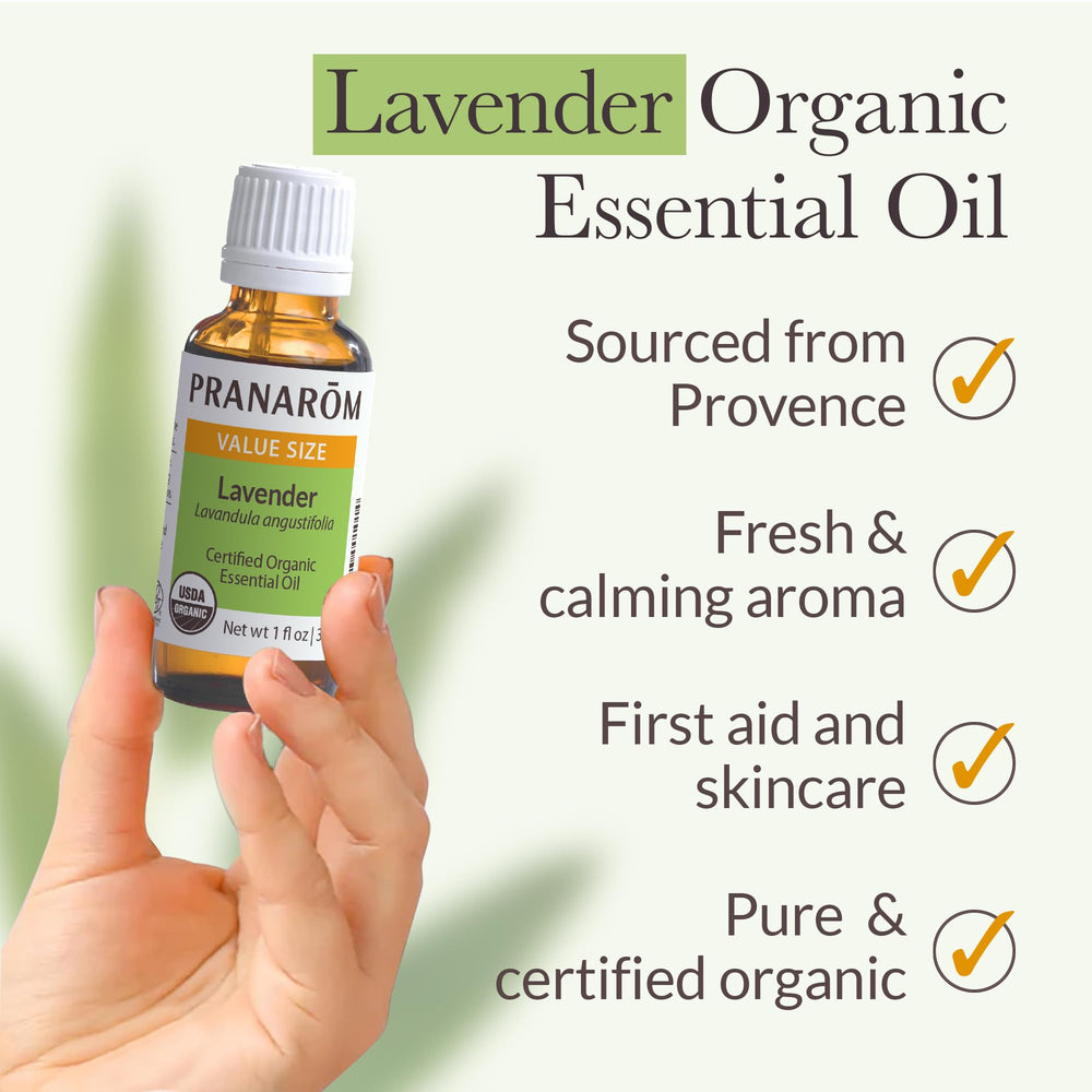 Pranarom Lavender Oil on skin for soothing blemishes and gentle skincare use.