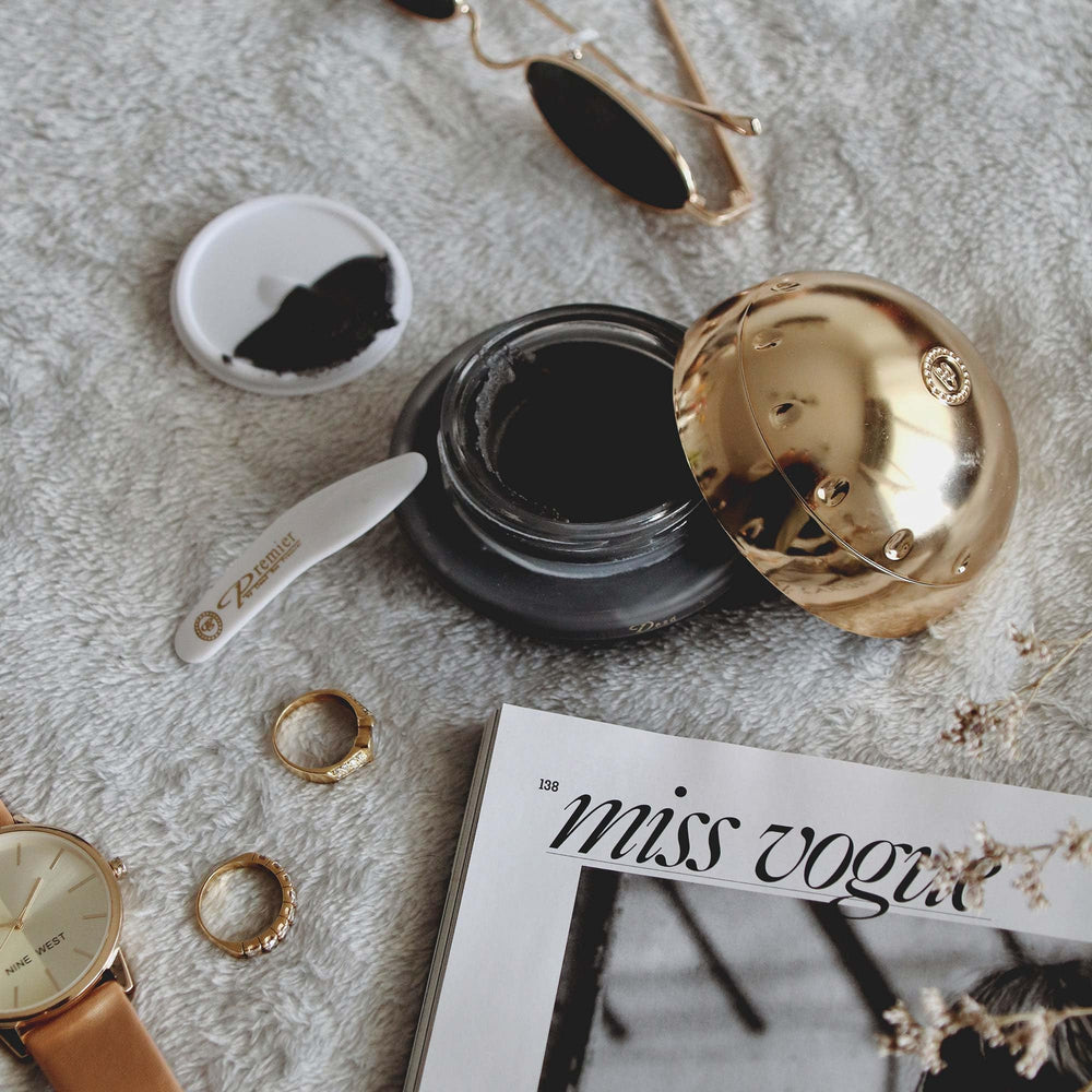 Premier Miracle Noir Mask face application suggests even coverage and gentle feel