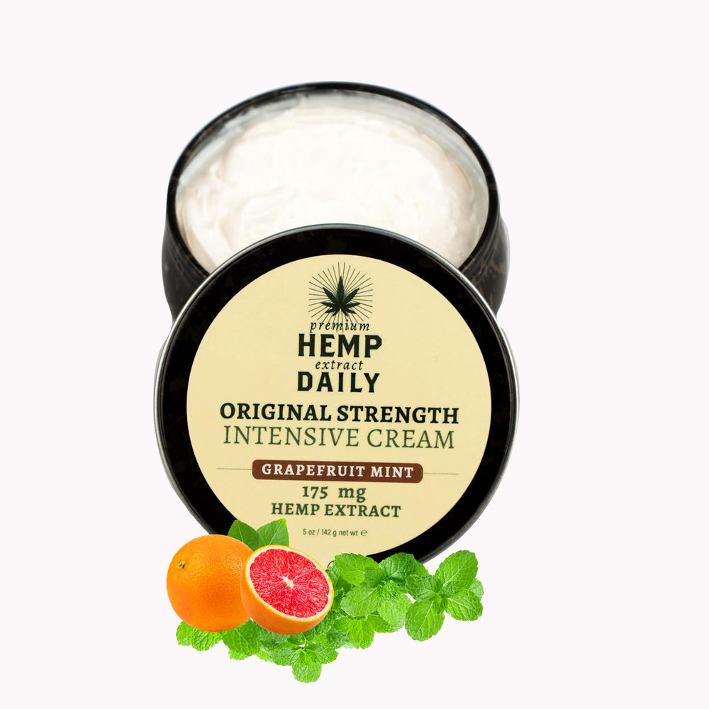 Premium Hemp Daily Intensive Cream bottle close-up showing grapefruit mint hydration.