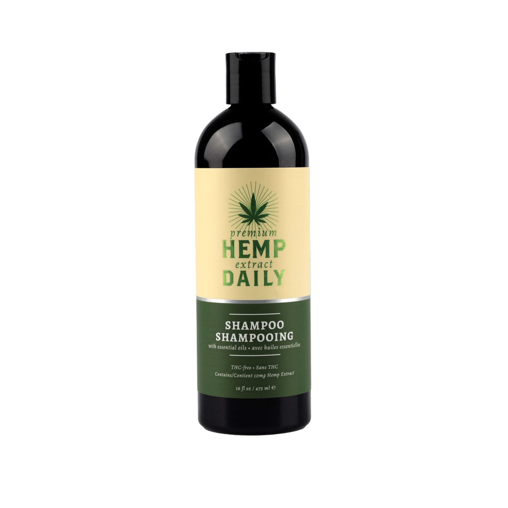 Pouring Premium Hemp Extract Daily Shampoo for a refreshing cleanse