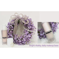 Priming Water a.t.o.m.y targeted glow on cheeks for healthy-looking radiance.