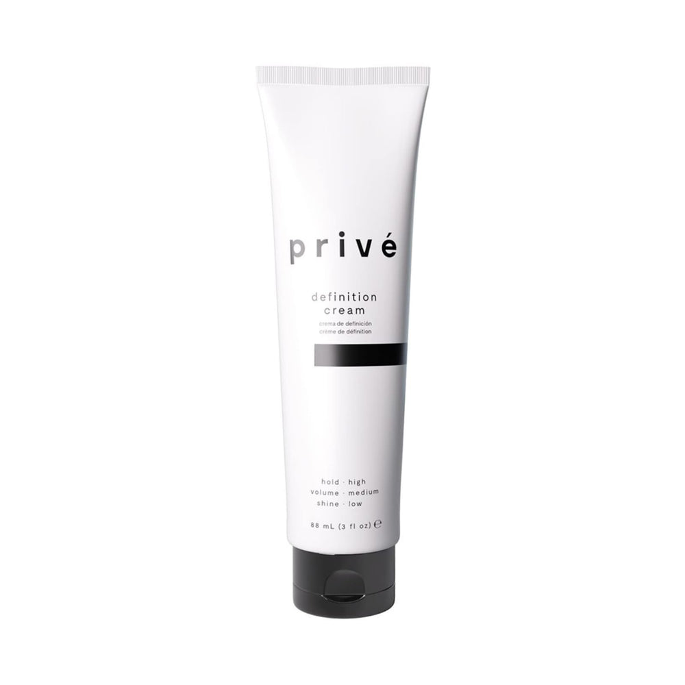Privé Definition Hair Cream smoothing application for a sleek finish.
