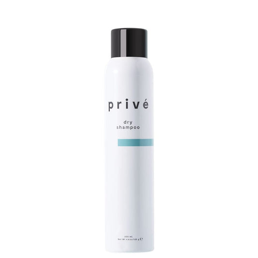 Privé Dry Shampoo Spray bottle showing charcoal-based oil absorption for refreshed roots.