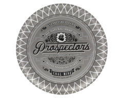 PROSPECTORS Coal Mine Matte Clay Pomade being warmed between hands for easy application.