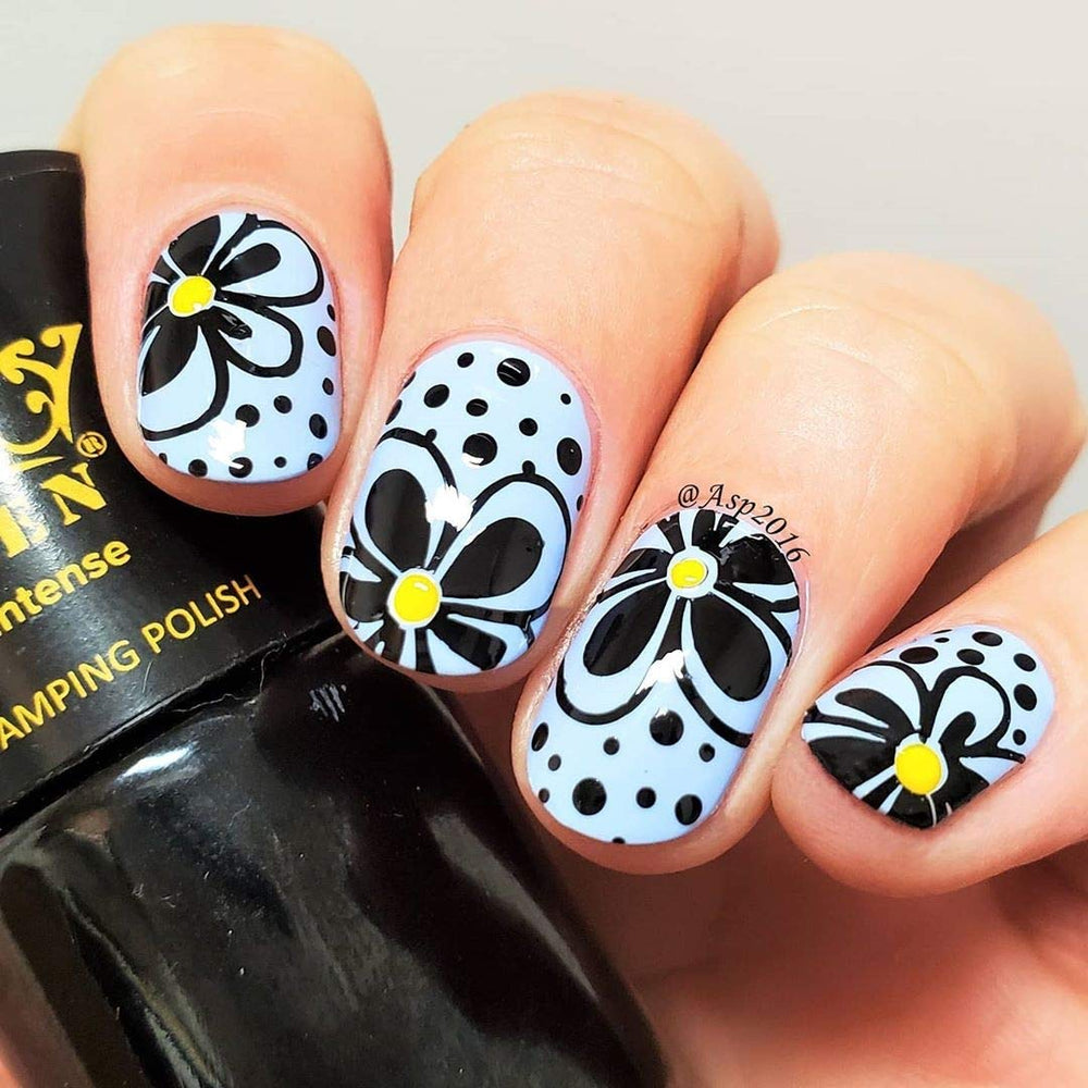 PUEEN brush applying stamping polish for smooth transfer.