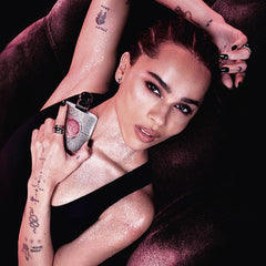 Spray on pulse points for a lingering gourmand mood with YSL Opium Glitter.