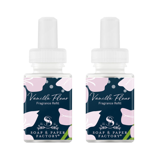 Pura Vanilla Fleur refill bottle ready for long-lasting fragrance in living room.