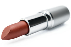Application of Pure Ziva Cinnabar Deep Red lipstick with metallic sheen on lips