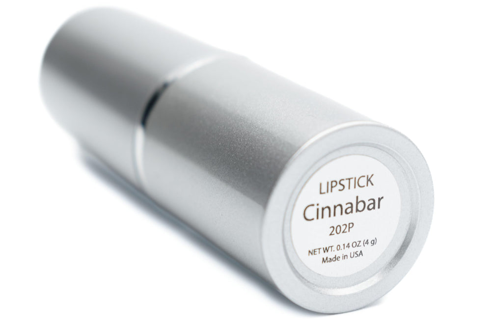 Swirl of Pure Ziva Cinnabar Deep Red lipstick in tube showing rich pigment