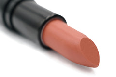 Pure Ziva Coral Orange Toffee lipstick tube shows moisturizing color.