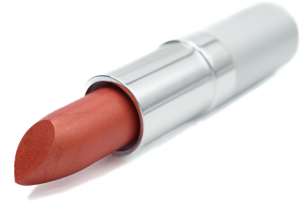 Pure Ziva Orange Sunset lipstick swatch on lips highlighting moisturizing feel.