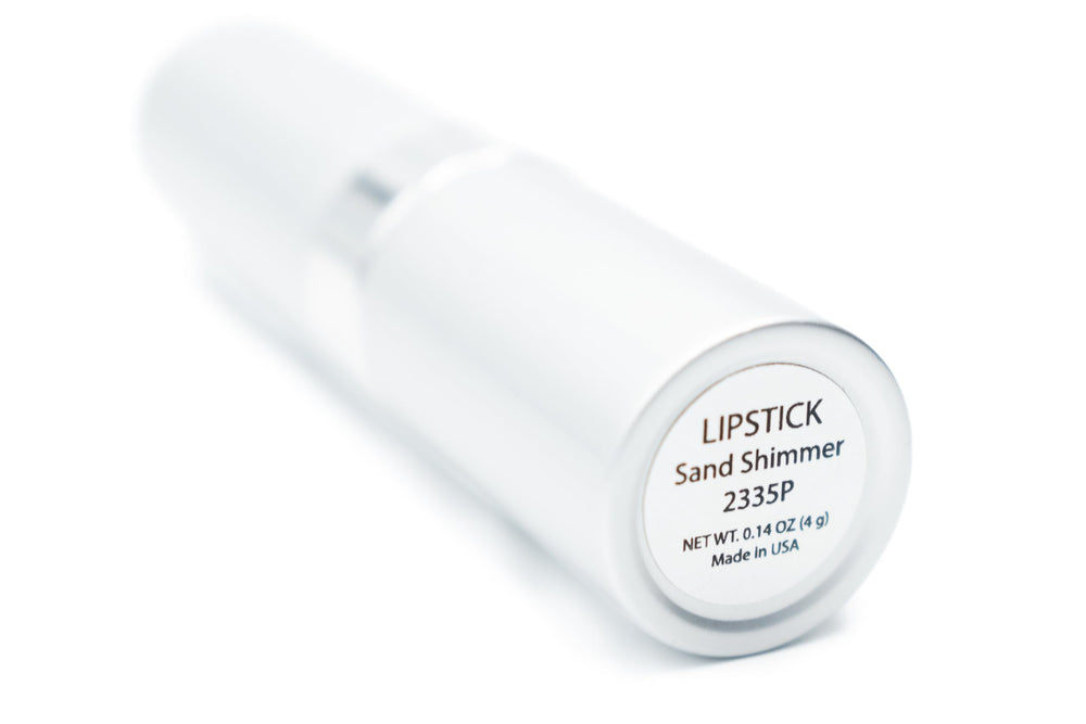 Pure Ziva Sand Shimmer lipstick swatch showing pale beige shade on skin.