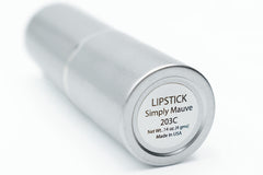Glossy satin finish detail on lips with Simply Mauve for subtle shine.