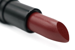 Pure Ziva Tempting lipstick swatch showing deep dark red shade for bold evening looks