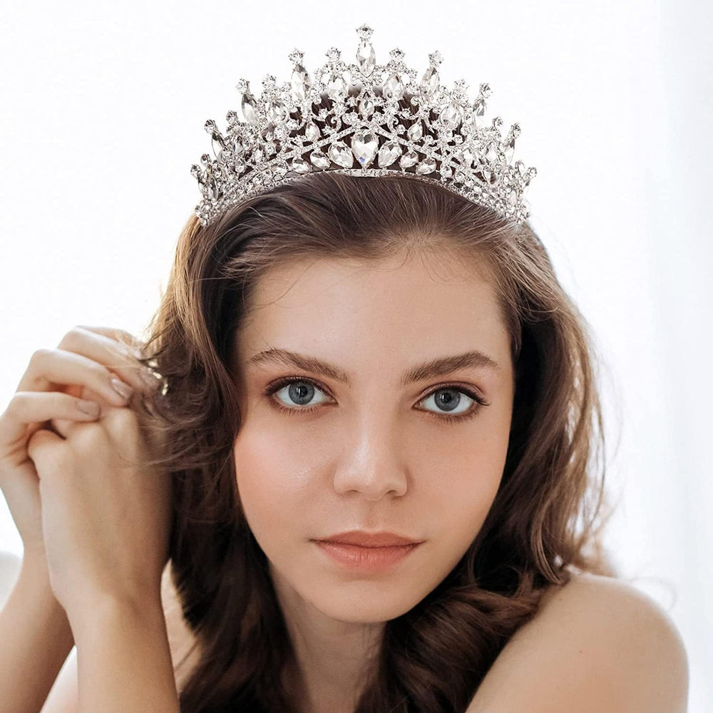 QIAIYALA rhinestone crown elevates wedding photos with timeless shine.