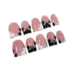 Qicaijia acrylic full-cover nails include adhesive glue for secure attachment.