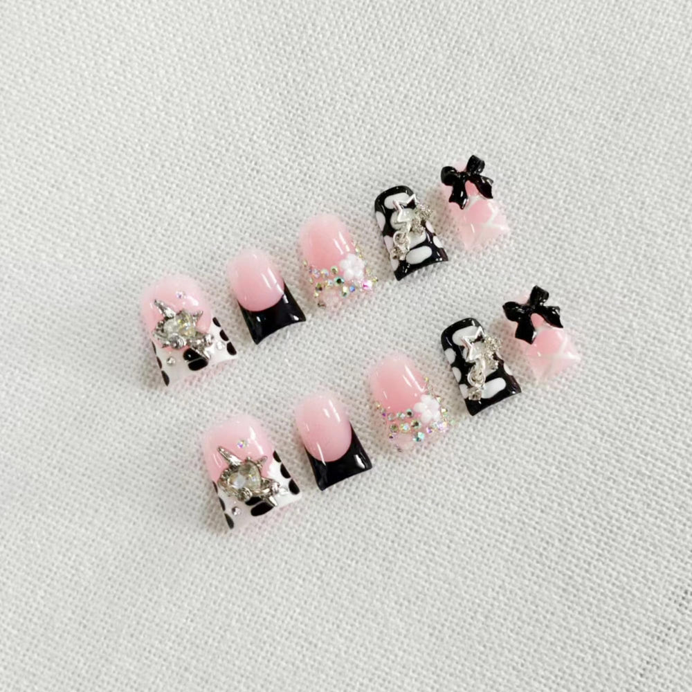 Qicaijia glossy acrylic finish nails with high-shine appeal.