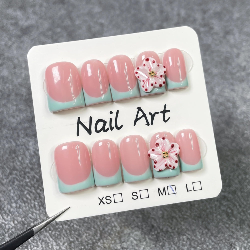 Qicaijia green French tip nails offering a chic, versatile look