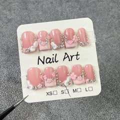 Qicaijia luxury rhinestone accent with pink French tip for glam occasions.
