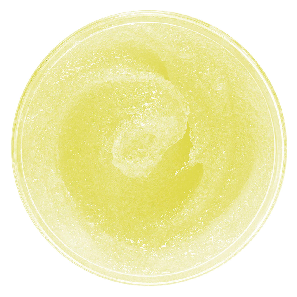 QTICA Smart Spa Sugar Scrub Lemon Dream cream-texture close-up shows gentle exfoliation.