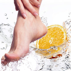 Professional salon scene with QTICA scrub showing easy, residue-free exfoliation