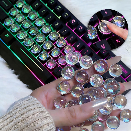 Quafochi keyboard stickers with clear glass bubbles for crisp key visibility and nail-art protection.