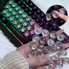 Quafochi keyboard stickers with clear glass bubbles for crisp key visibility and nail-art protection.