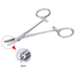 QWALIT dermal tops ball-catch tool for easy top changes.