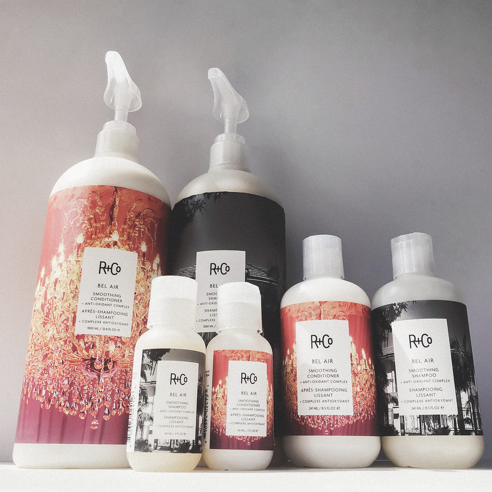 R+Co Bel Air smoothing conditioner application on damp hair for detangling.