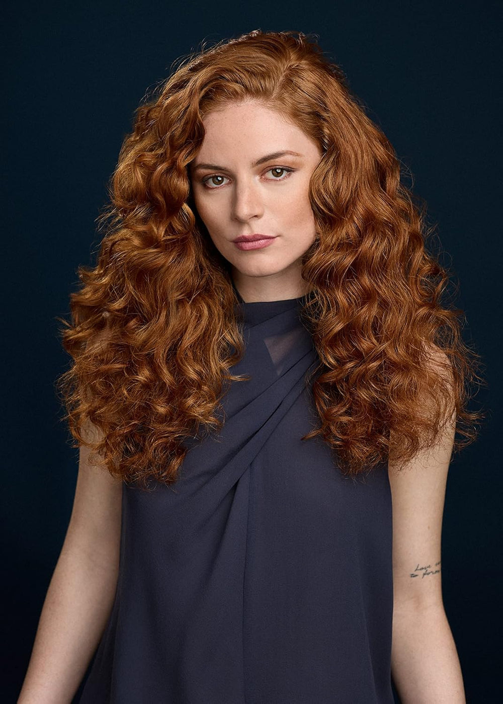 R+Co BLEU model curls demonstrate natural texture and shine