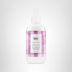 R+Co Candy Stripe detangler for weightless hydration and smooth roots-to-ends.