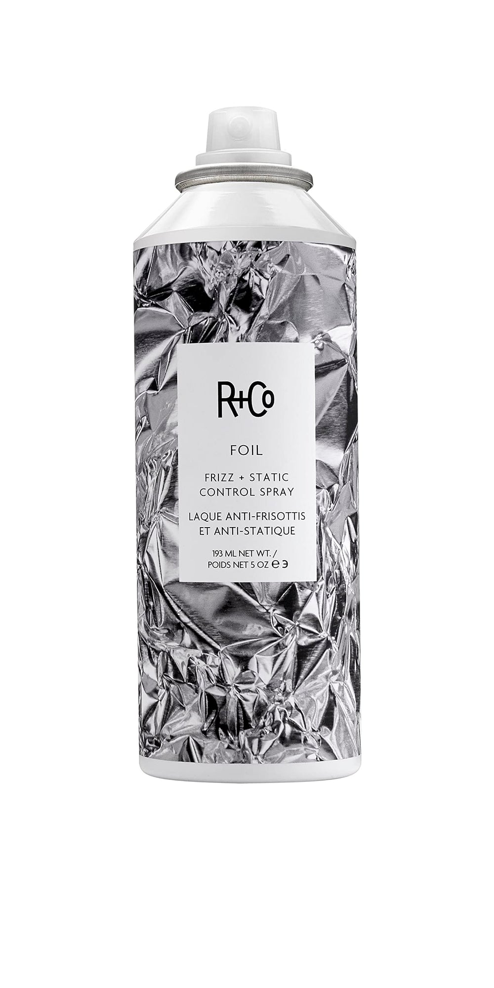 R+Co Foil Frizz + Static Control Spray bottle delivers sleek, frizz-free shine.