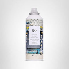 R+Co Halfpipe finishing spray provides flexible hold on curls.
