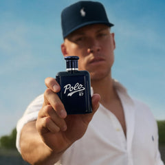 Ralph Lauren Polo 67 pulse point application on wrists and neck.