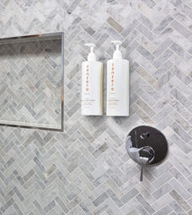 RAPSI ZENZERO ingredients panel featuring Tarocco orange and ginger extracts for bright aroma and skin feel.