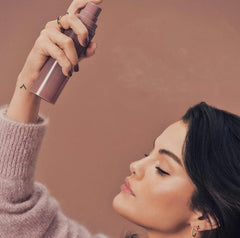 Rare Beauty Find Comfort Fragrance Mist spray demonstrates refreshing scent with lemon zest and vetiver
