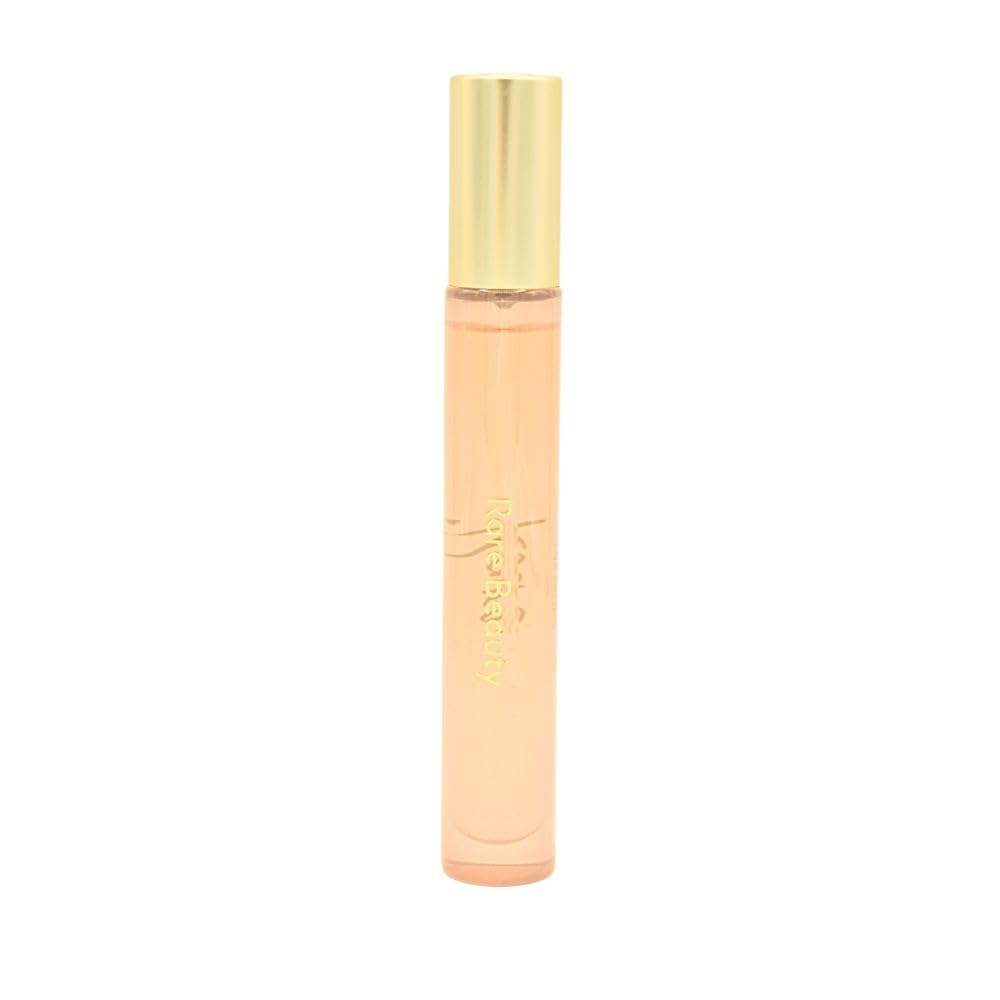 Rare Eau de Parfum travel spray bottle with vanilla and ginger aroma, ideal for on-the-go use.