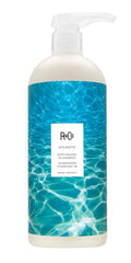 R+Co Atlantis moisturizing shampoo bottle front with smooth, hydrated hair implications.
