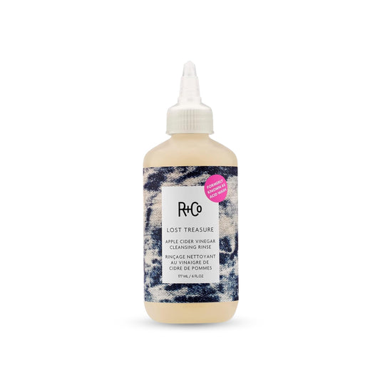 R+Co bottle front view showing product and clean packaging benefit