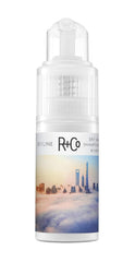 R+Co Skyline dry shampoo powder demonstrates precise application for targeted root refresh