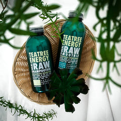 Real Raw Tea Tree ingredients close-up highlights aloe and coconut water