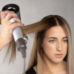 Redavid Blonde Dual Therapy bottle with purple cap signaling pigment for cool tones.