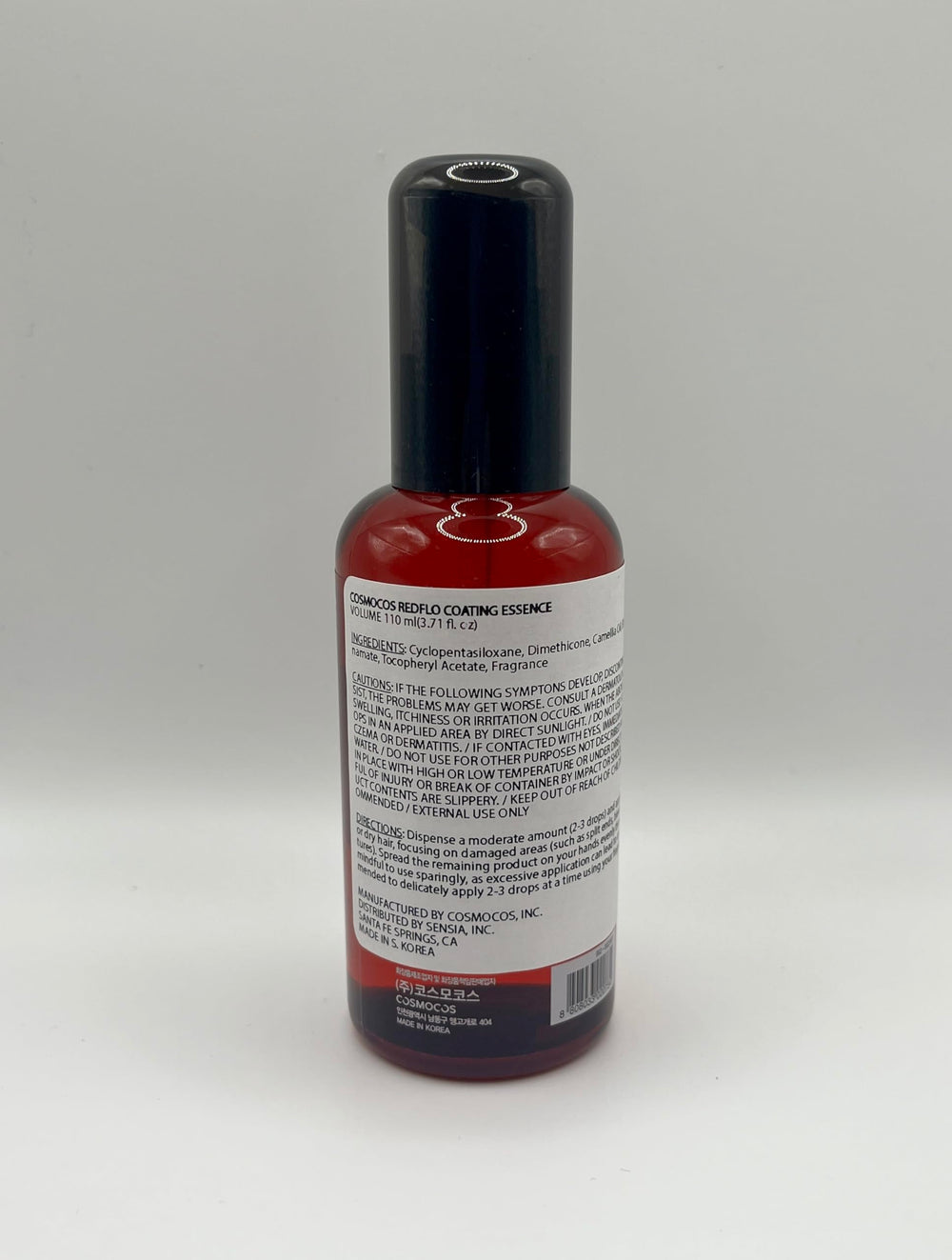 Redflo Camellia Essence coats the cuticle for smoother hair