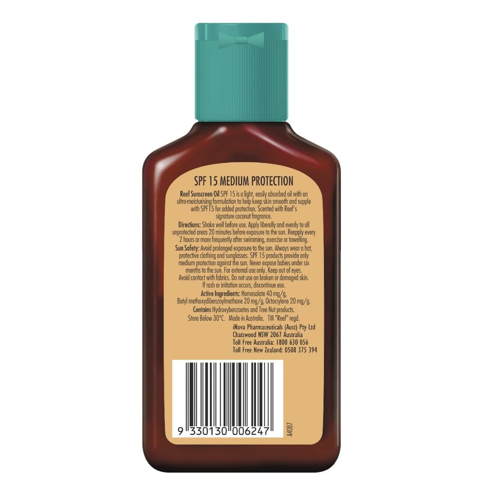 REEF Dark Sun Tan Oil Coconut 125ml – application shot, ideal for beach days and daily moisture.