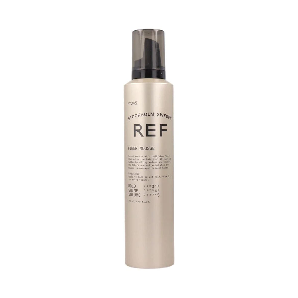 REF Reference Ref 345 fiber mousse bottle for lightweight hold and natural texture.