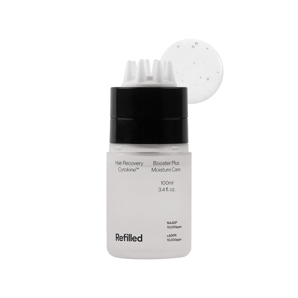 Refilled Booster Plus Moisture bottle with built-in massager for easy scalp care and fast absorption.